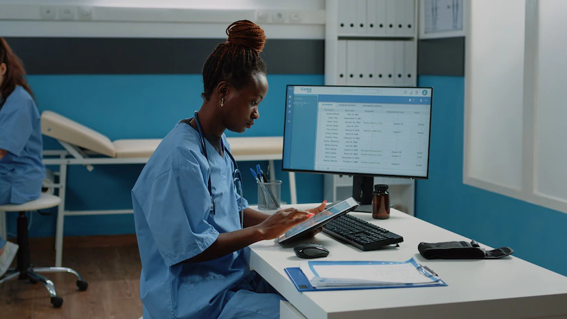african-american-nurse-using-digital-tablet-treatment_482257-26738