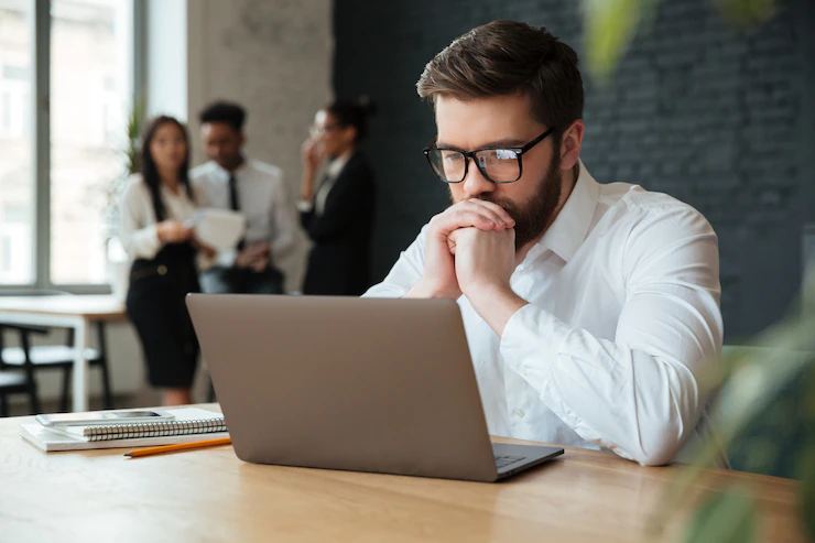young-man-working-with-laptop-man-s-hands-notebook-computer-business-person-workplace_158538-8138-1